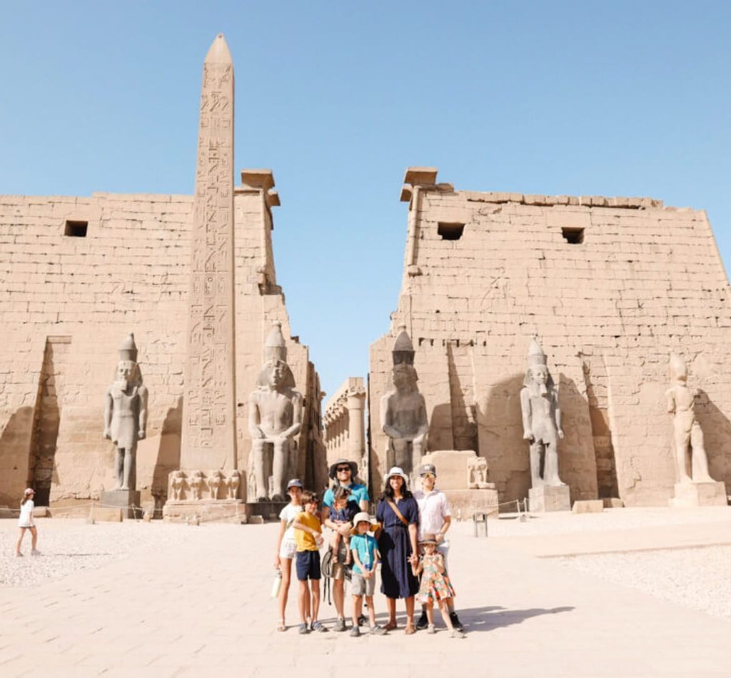 A wonderful photo of a family in front of Luxor Temple