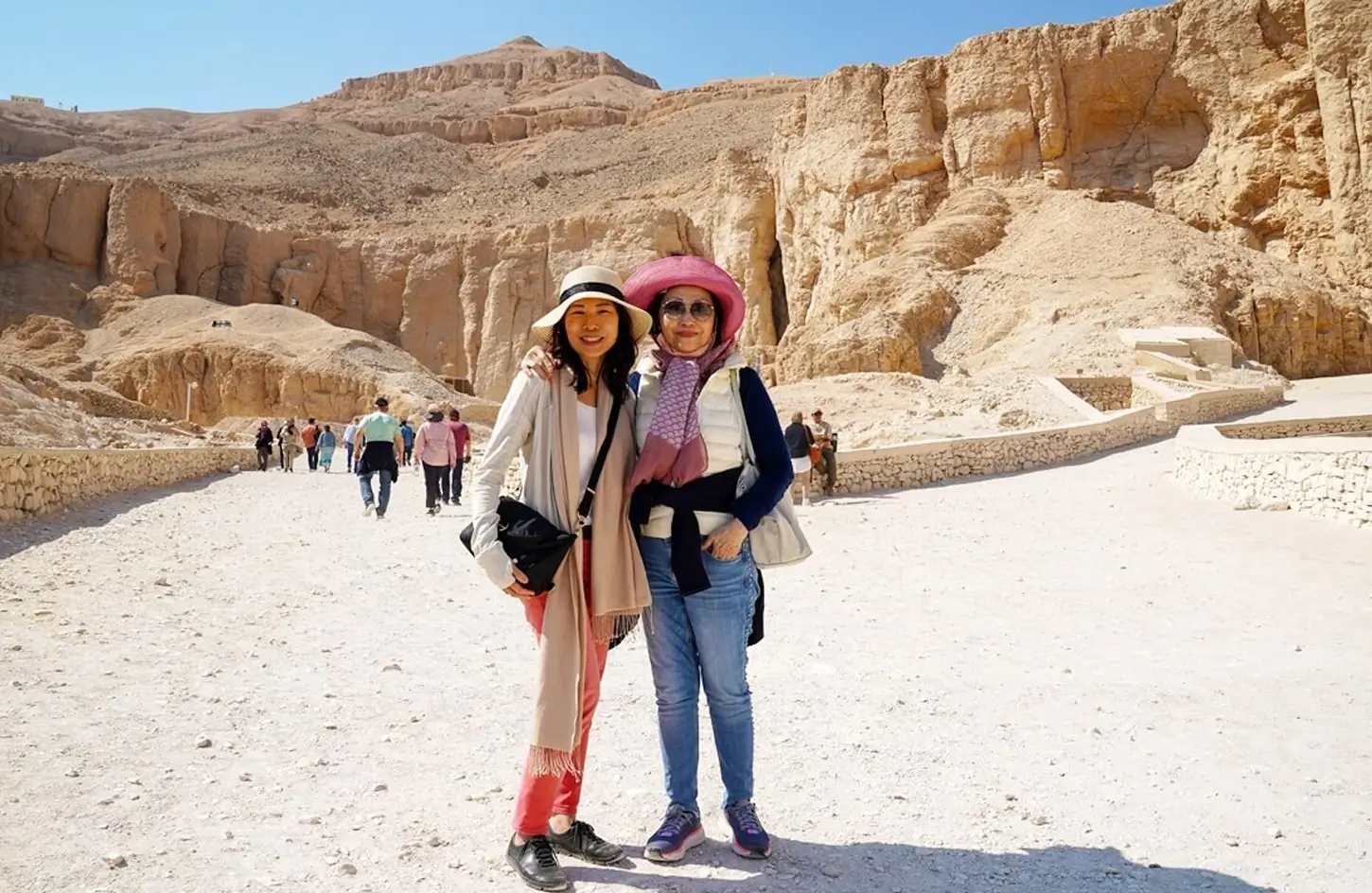 A stunning photograph of a girl and her mother at the Valley of the Kings temple in Luxor.