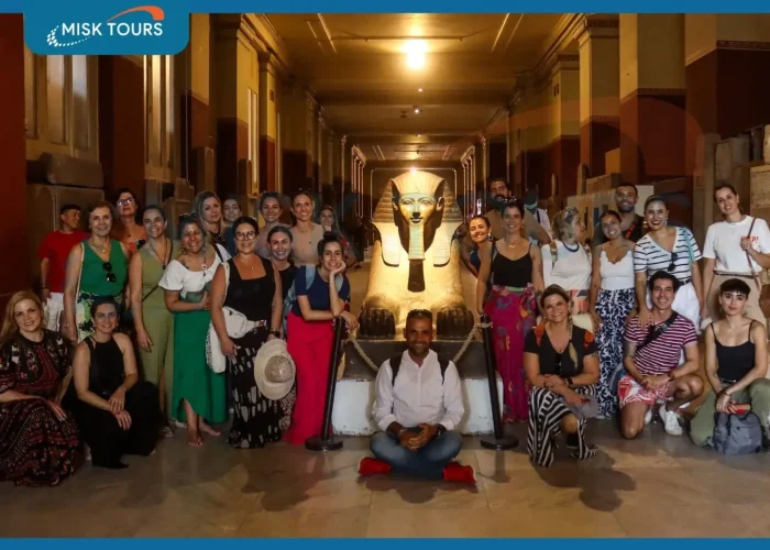 a-wonderful-picture-of-a-tour-group-standing-in-front-of-a-sphinx-statue-in-the-egyptian-museum