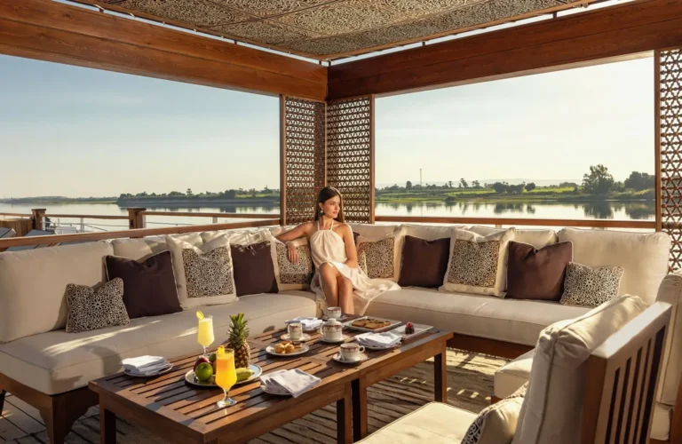 A stunning photo of a girl sitting inside one of the Nile cruise ships.