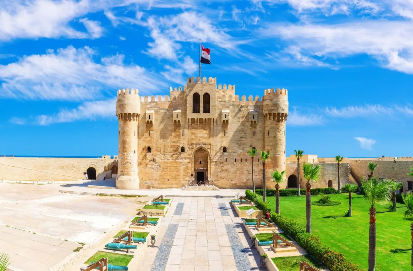 Exploring the courtyard and stone fortress of Qaitbay Citadel, a key entry for things to do in Alexandria.