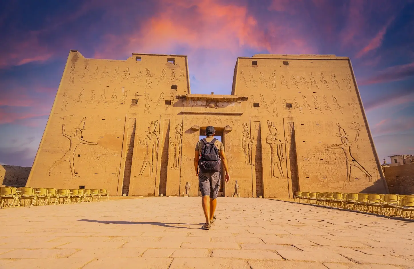 Tourist in front of the Temple of Edfu