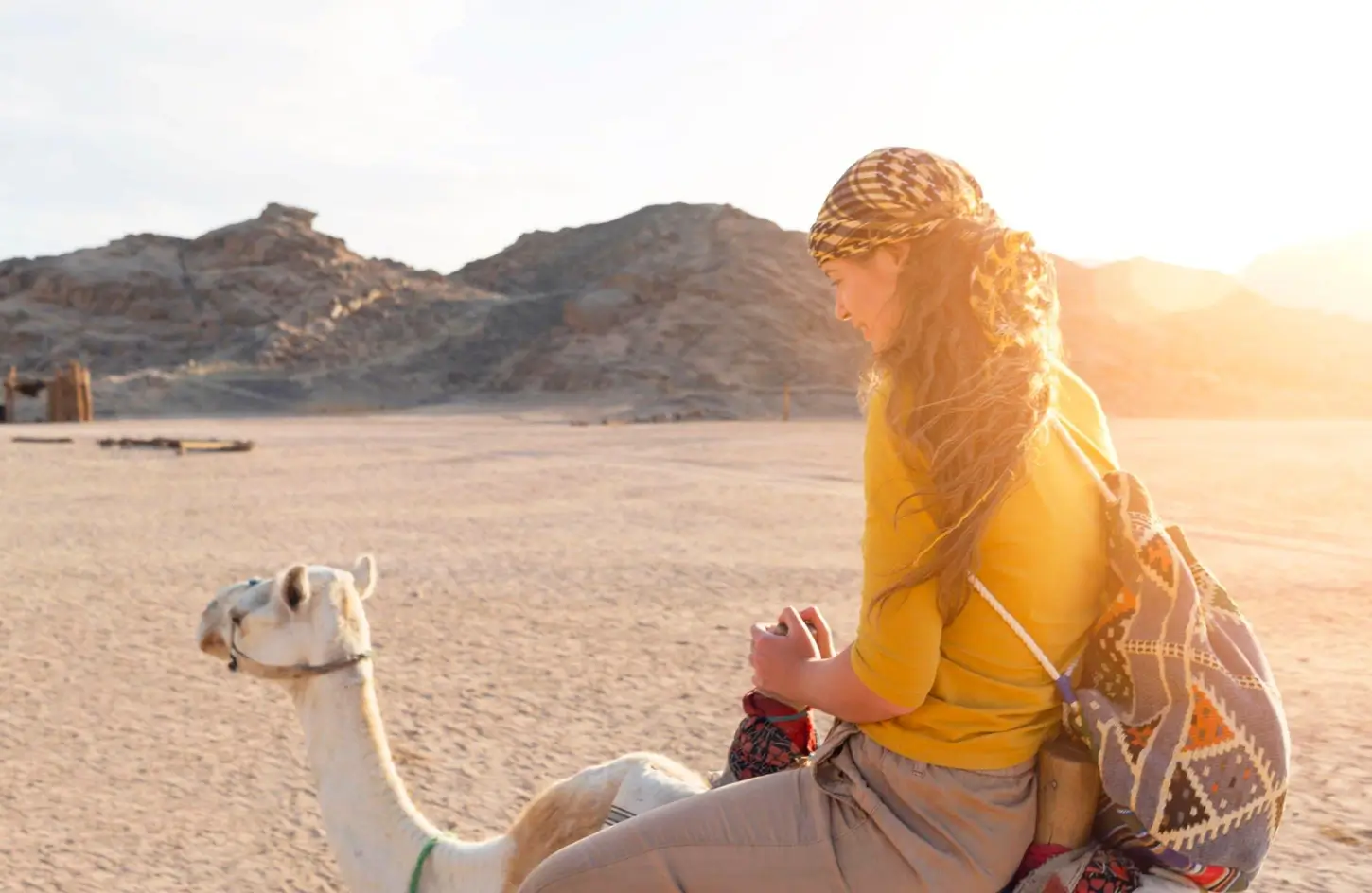 Girl on a camel ride in the Red Sea desert