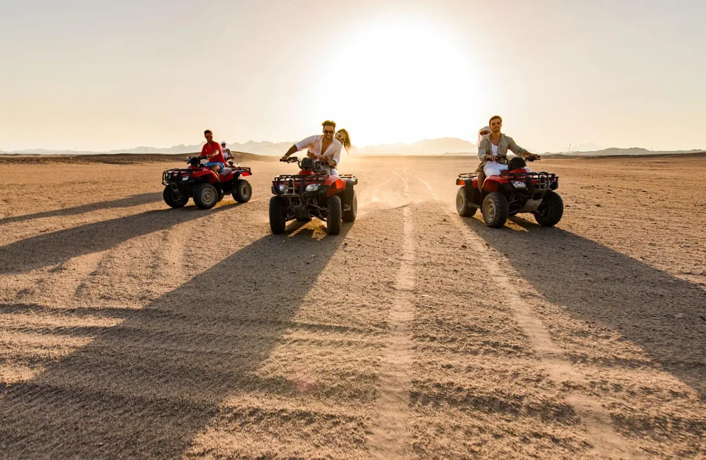 Group of couples on a quad bike adventure in the desert near Sharm el-Sheikh