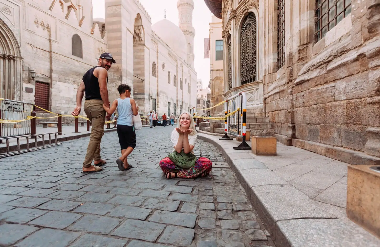 Tourist walking in Al-Muizz Street, historic Cairo
