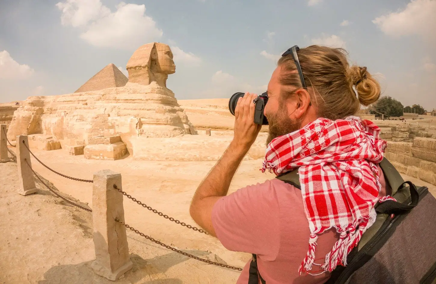 Tourist taking a photo of the Great Sphinx, Giza